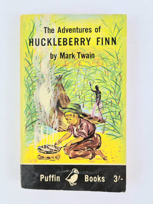 Huckleberry Finn, vintage childrens book with a nice cover design 
