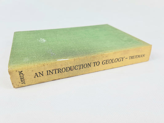 Green antique book. Geology by Arthur Trueman 