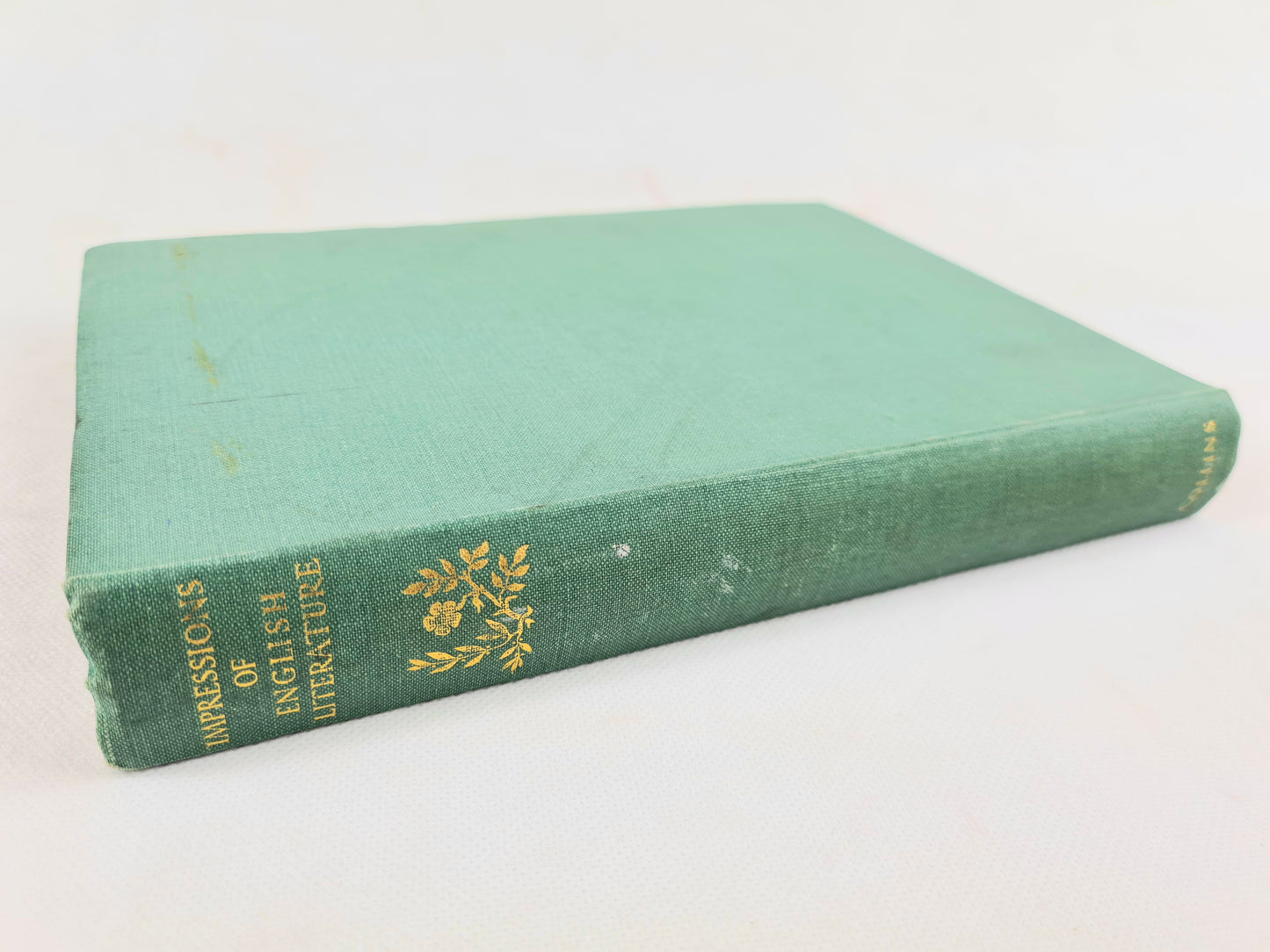 Decorative green and gilt book on English