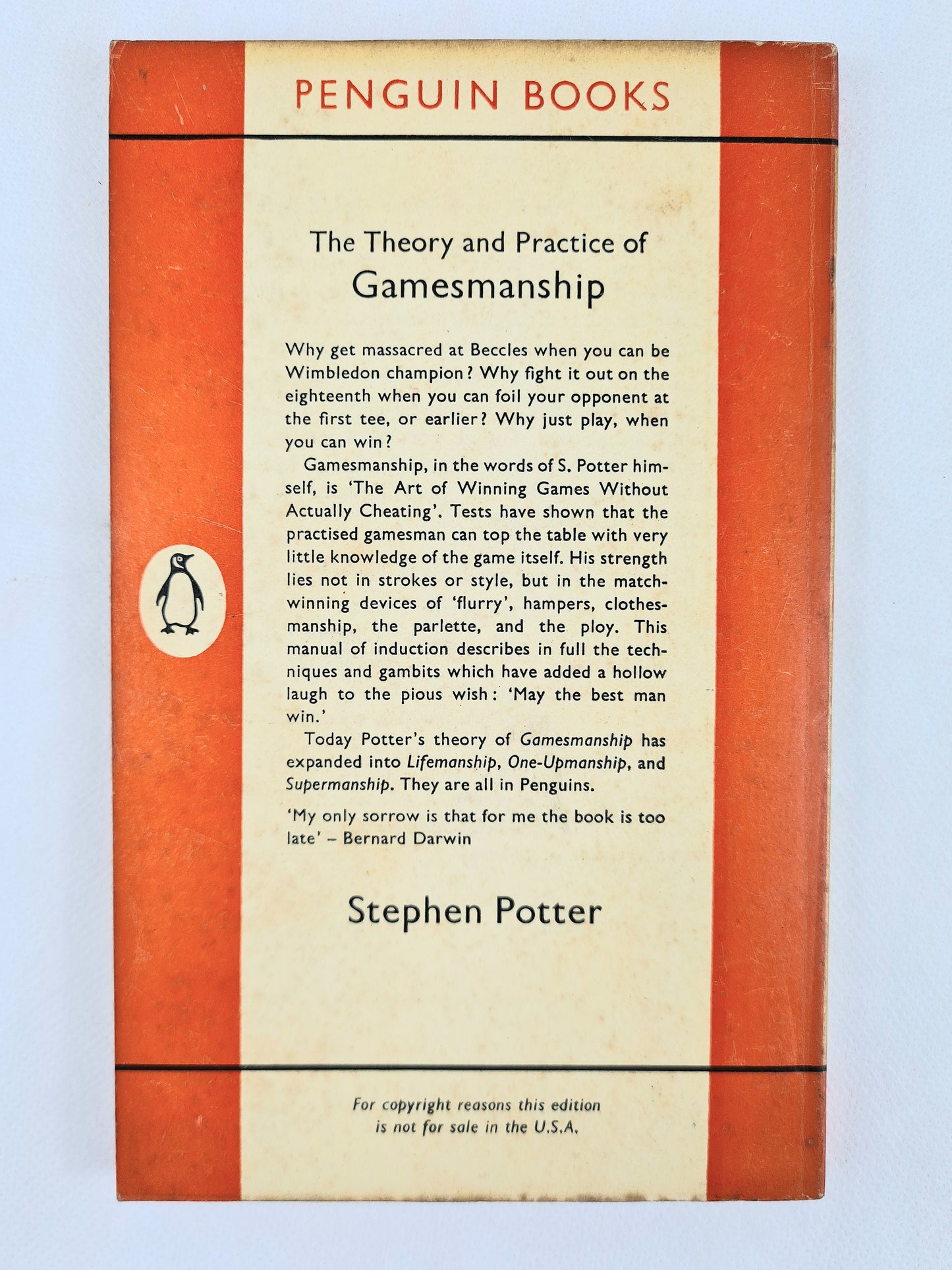 The Theory and Practice of Gamesmanship by Stephen Potter. Vintage orange Penguin Book