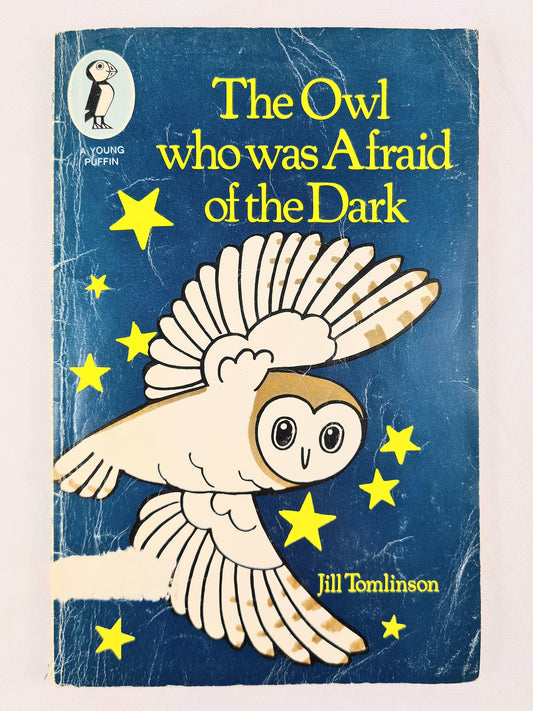 Book cover of 'The Owl who was Afraid of the Dark' with an owl illustration on a blue background.