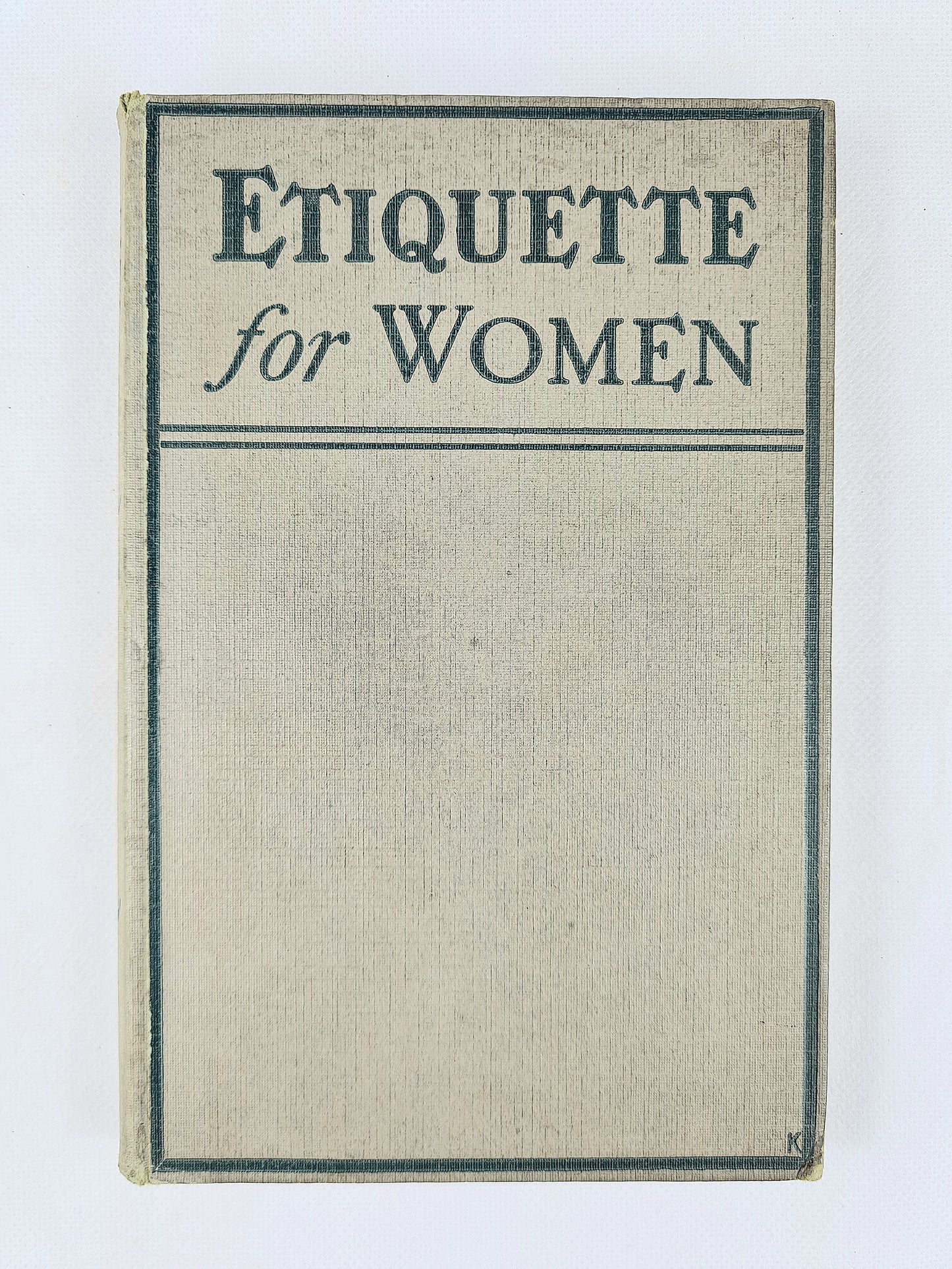 Book cover of 'Etiquette for Women' with a plain background