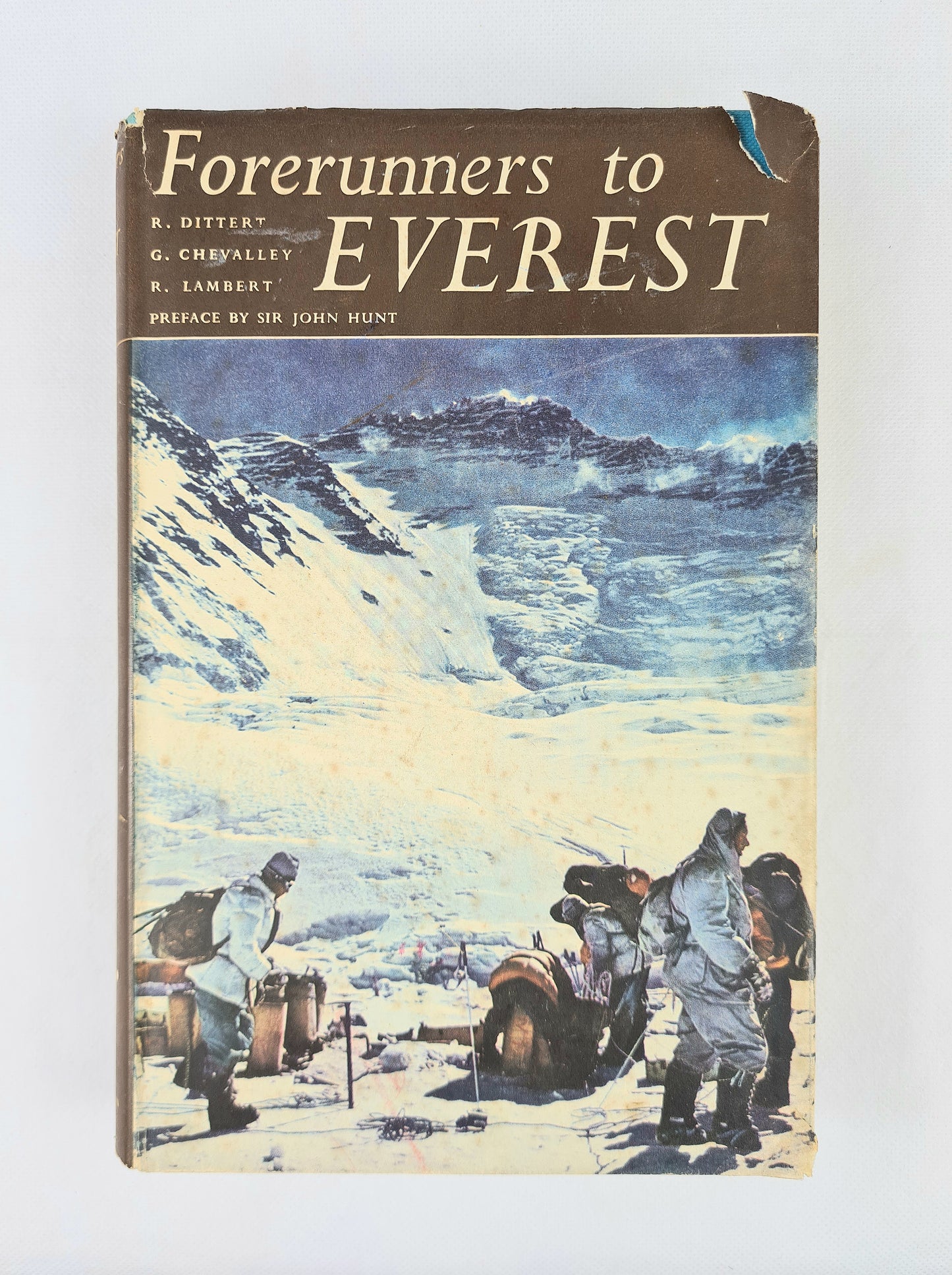 Vintage mountaineering book with an image of climbers on the cover. 