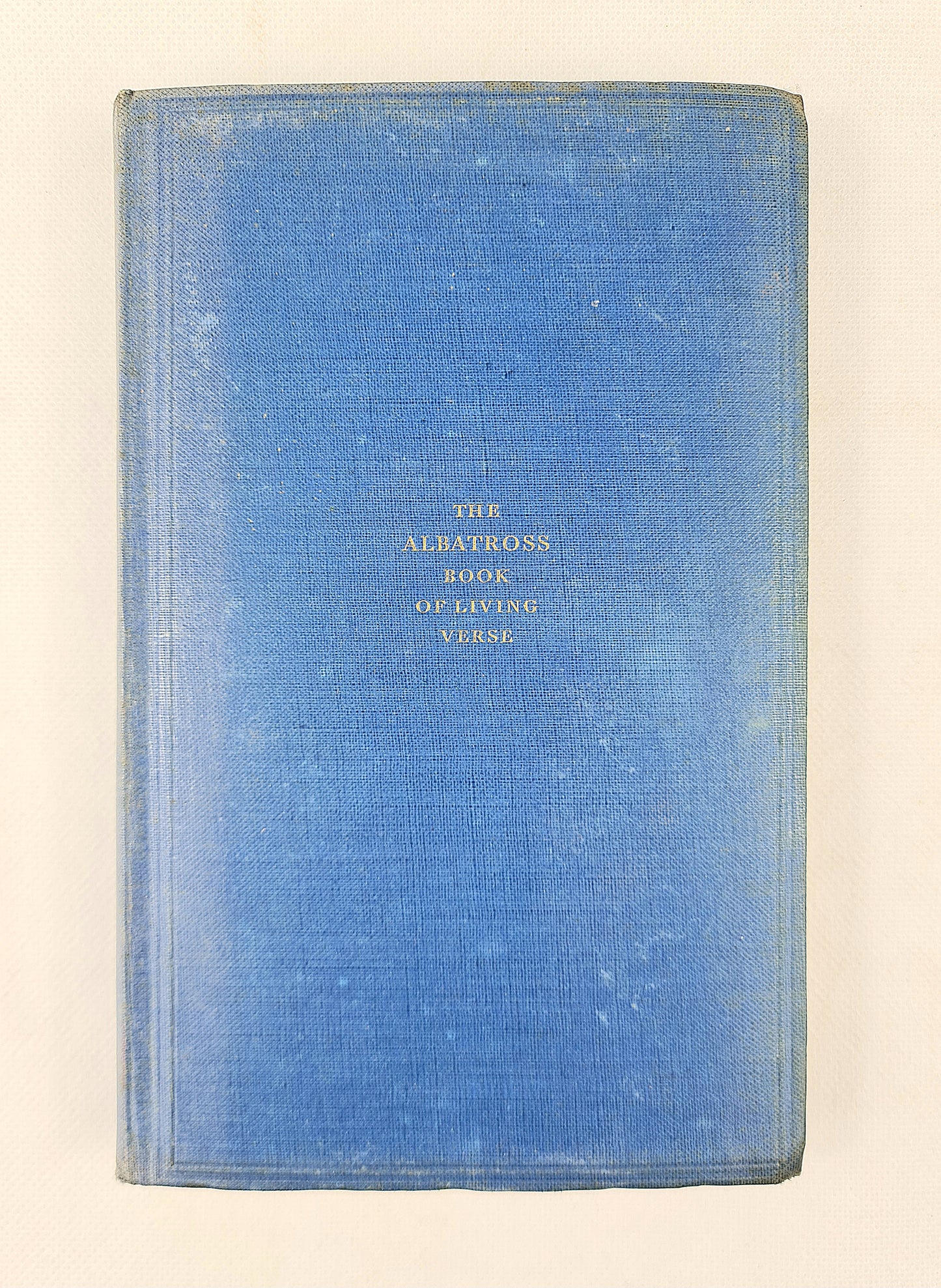 Blue vintage poetry book on a white background 