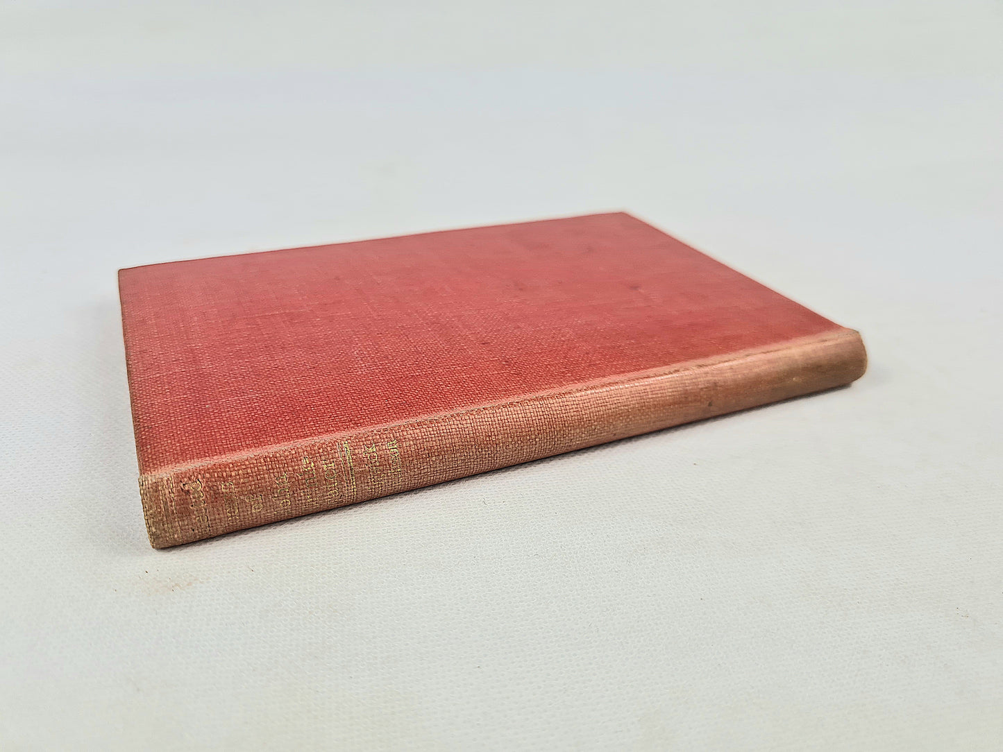 Red antique poetry book by john drinkwater