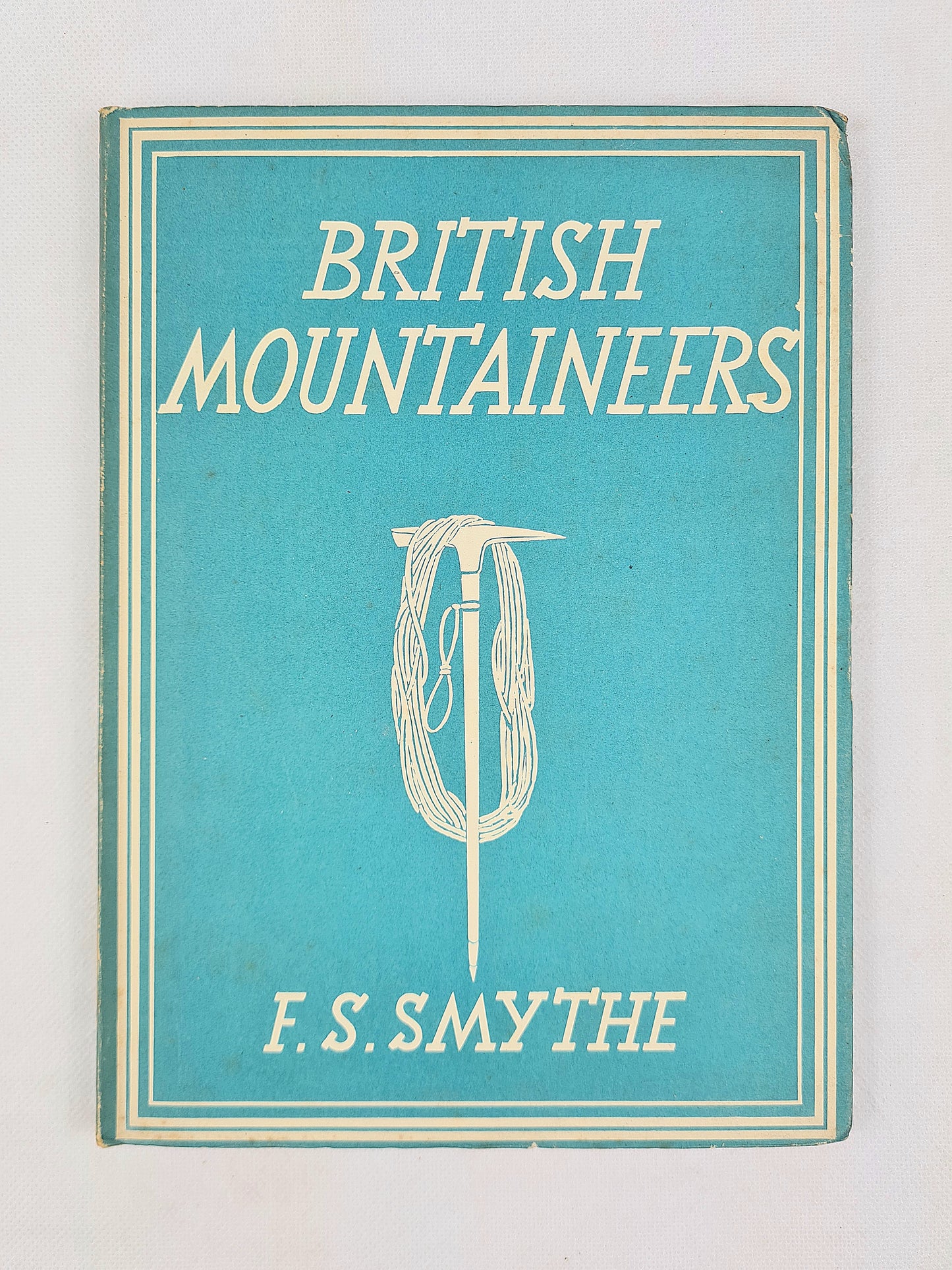 Book cover of 'British Mountaineers' by F.S. Smythe with a blue background and white text.