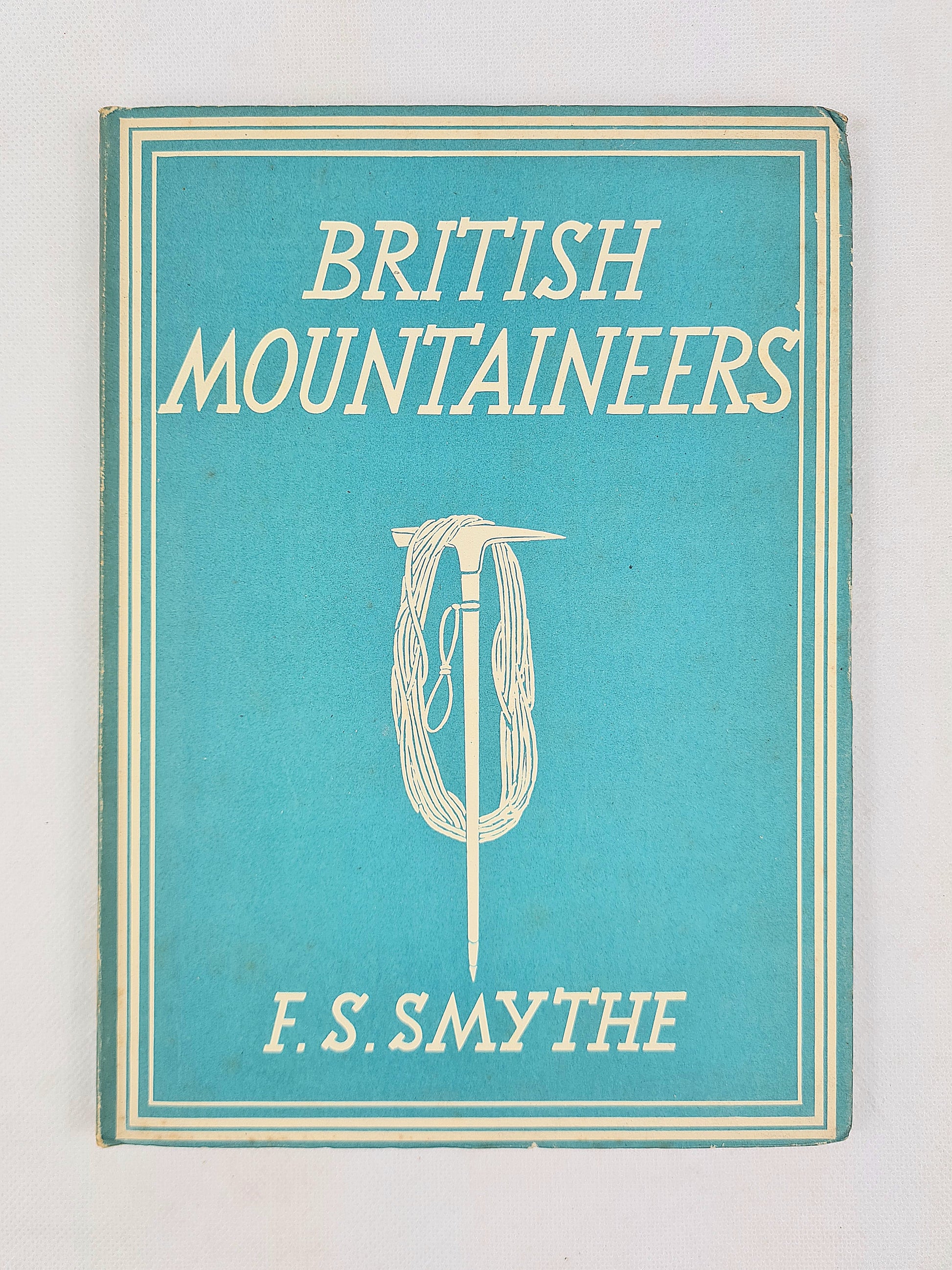 Book cover of 'British Mountaineers' by F.S. Smythe with a blue background and white text.