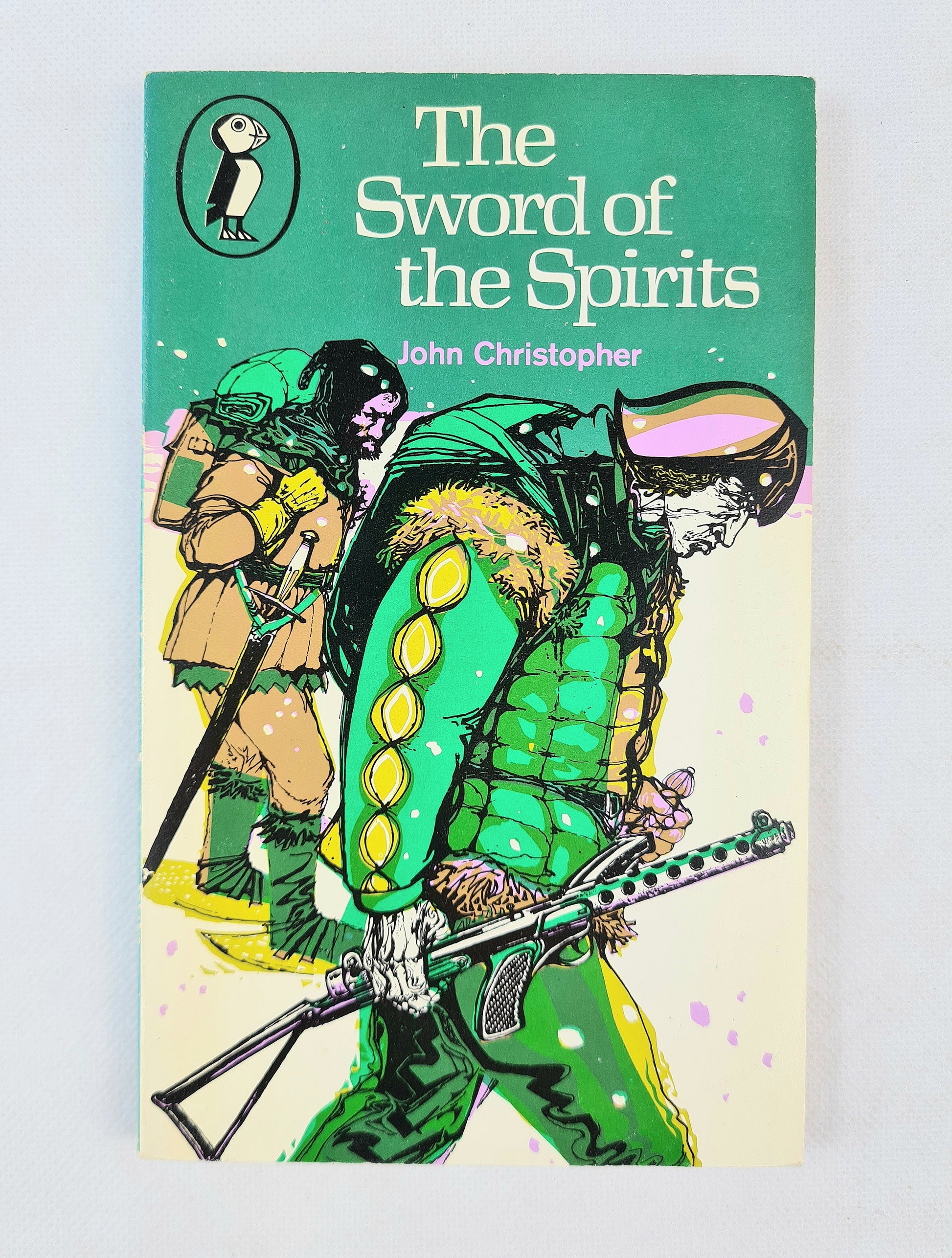 Book cover of 'The Sword of the Spirits' by John Christopher with green and yellow illustration.