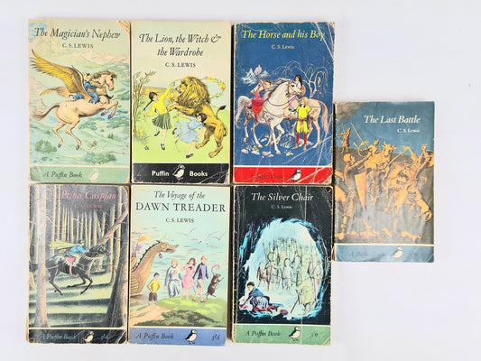 Set of C.S. Lewis books from Puffin Books on a white background