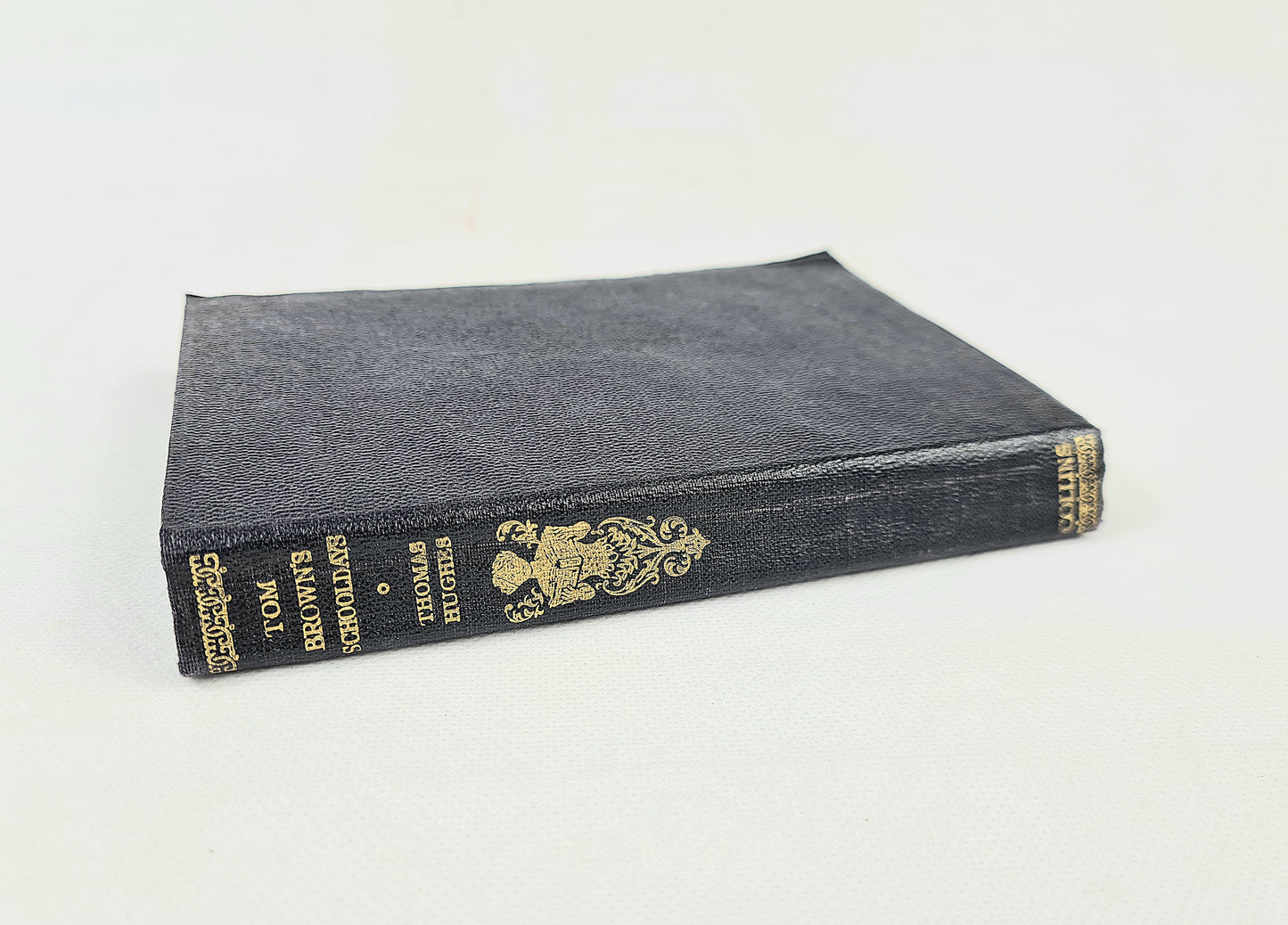 Vintage book with decorative cover on a white background
