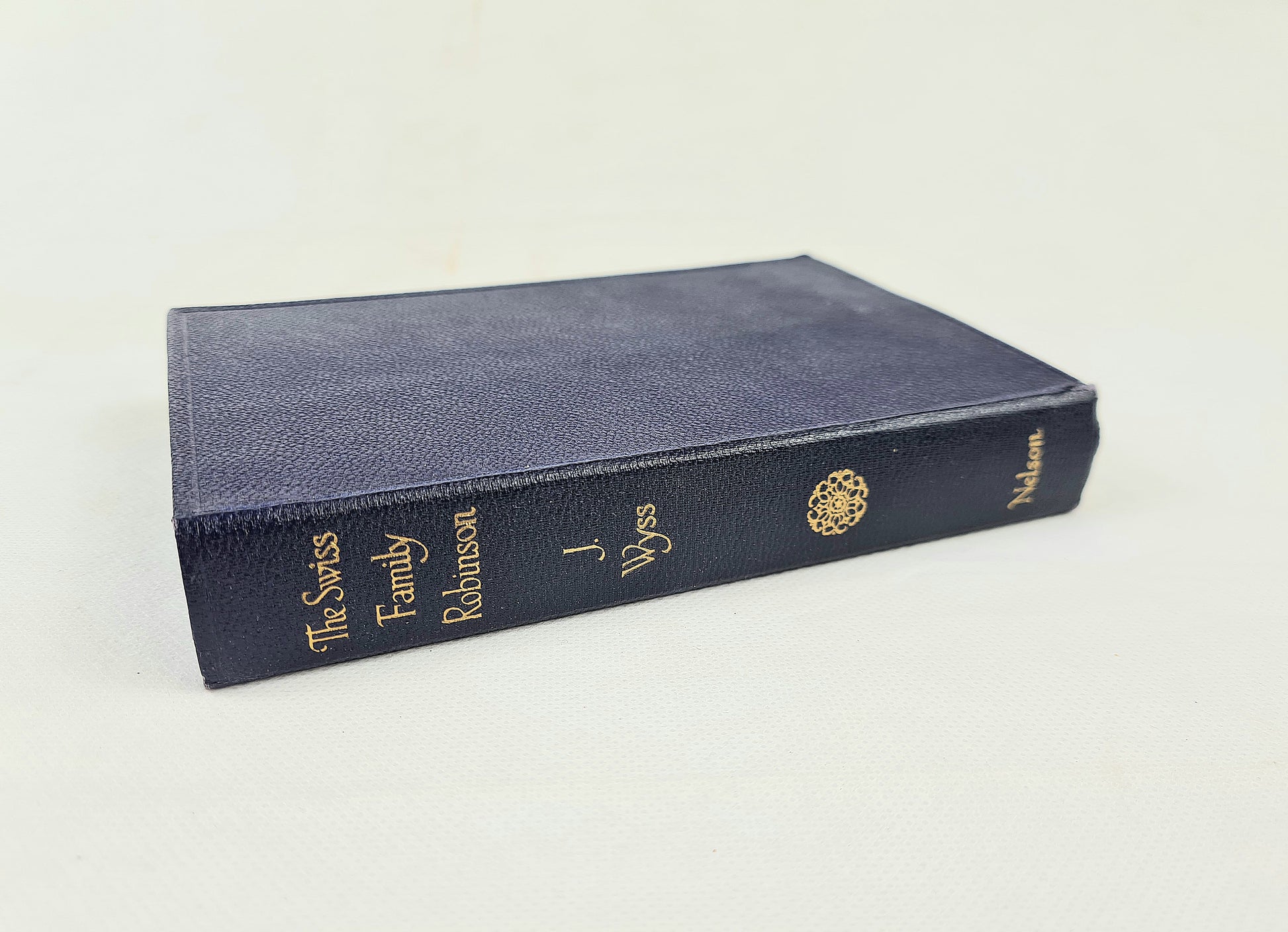 Vintage book. The Swiss family robinson on a white background 