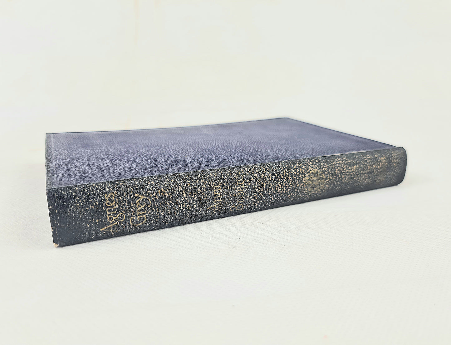 Vintage edition of Agnes Grey by Anne Bronte on a white background 