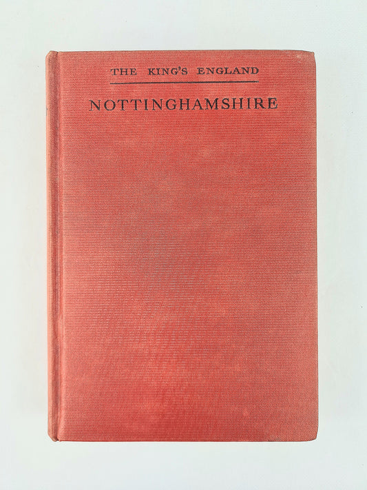 A vintage hardcover book titled 'The King's England Nottinghamshire' with a textured red cover and black printed text, shown against a plain off-white background.
