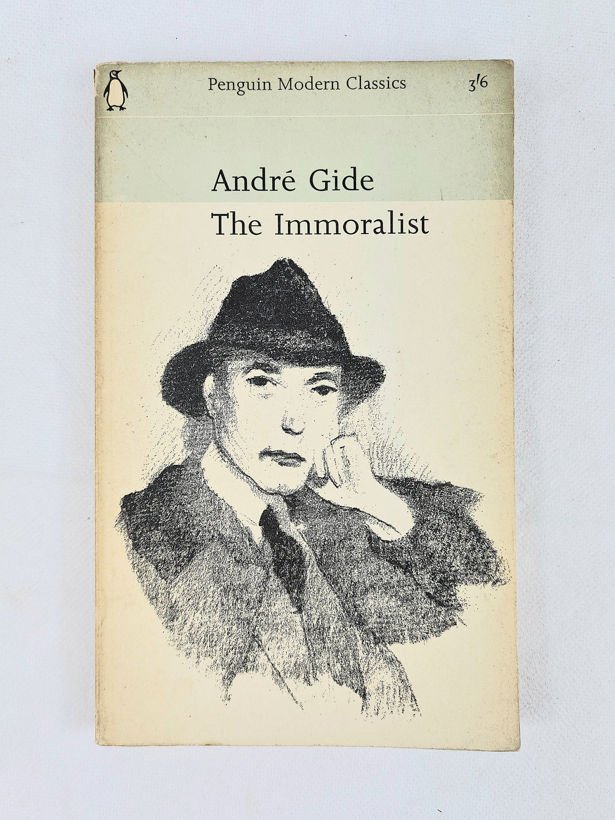Angled view of The Immoralist paperback showing the cover and spine
