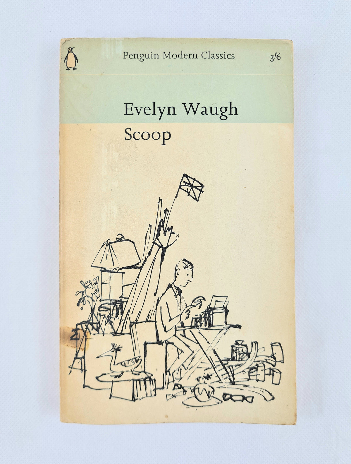 Vintage paperback book cover of Evelyn Waugh's 'Scoop' from Penguin Modern Classics, featuring a light green top band and a cream-colored cover with a black line drawing of a cluttered office scene.