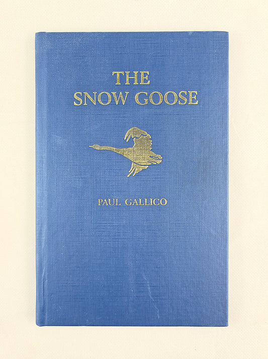The snow goose by paul gallico. Vintage hardback book on a white background 