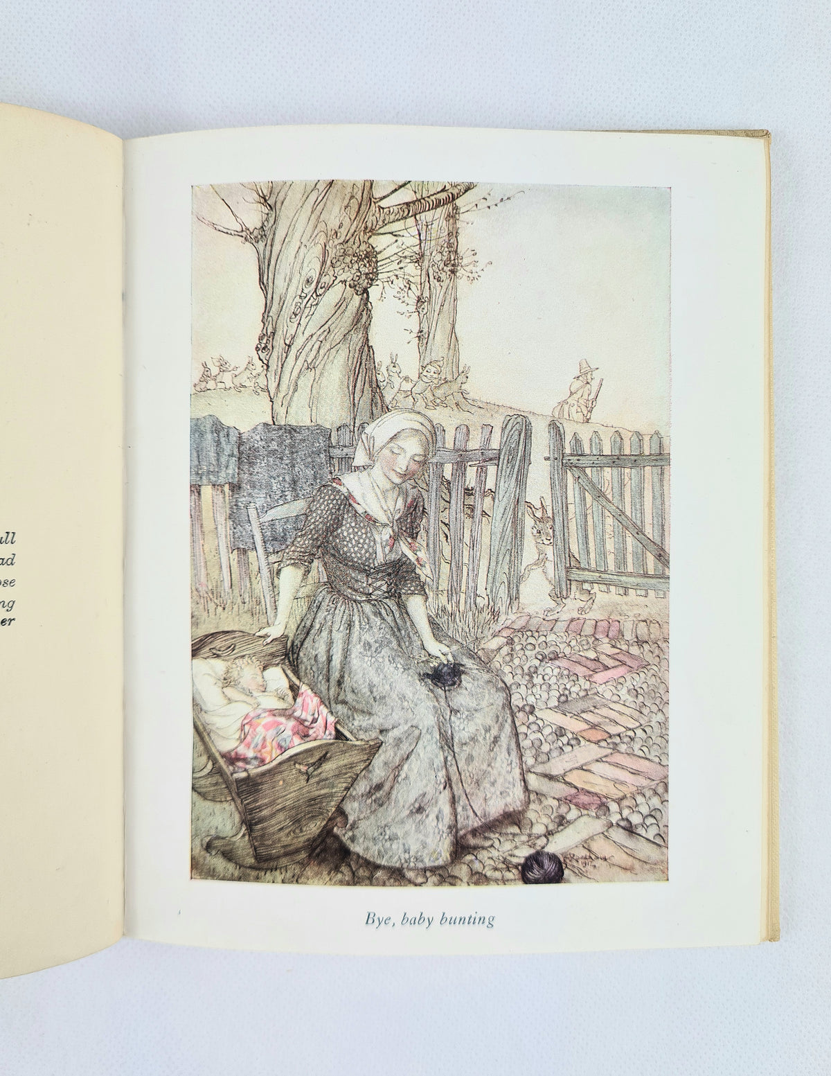 Arthur Rackham's Bye, baby bunting colour plate in Mother Goose: The Old Nursery Rhymes Vol. I