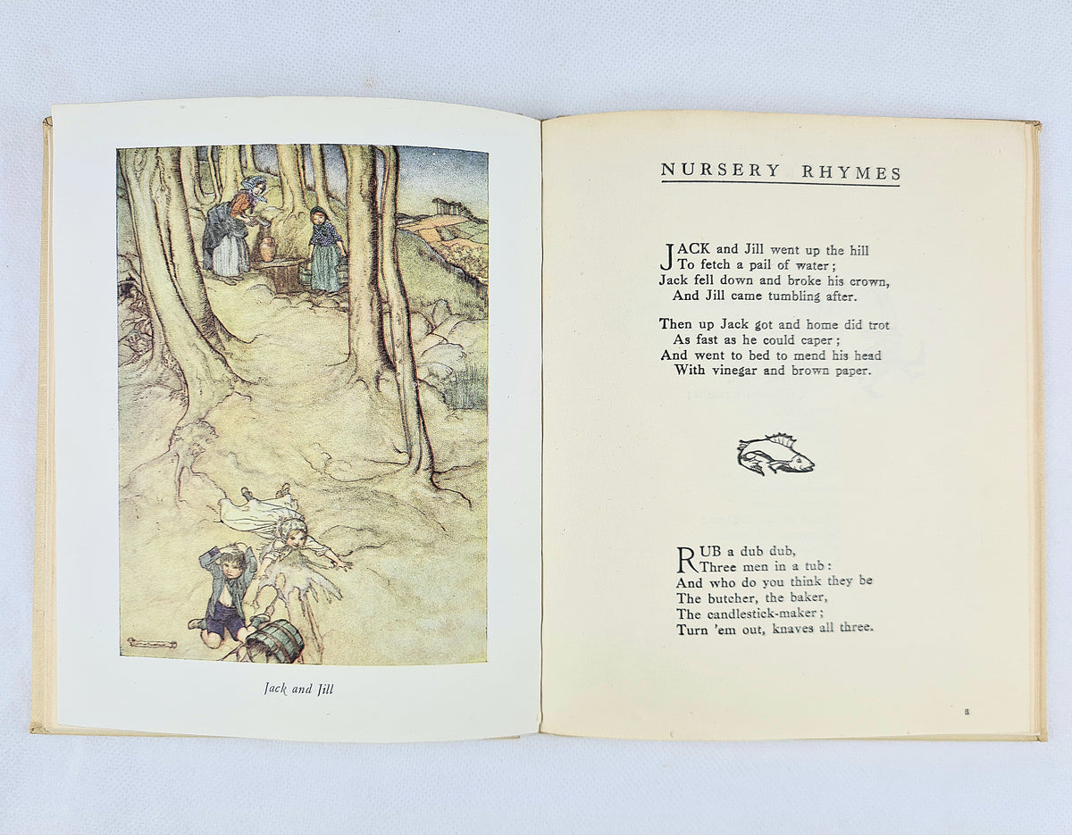 Interior spread of Mother Goose: The Old Nursery Rhymes Vol. I showing Arthur Rackham's Jack and Jill colour plate beside nursery rhyme text