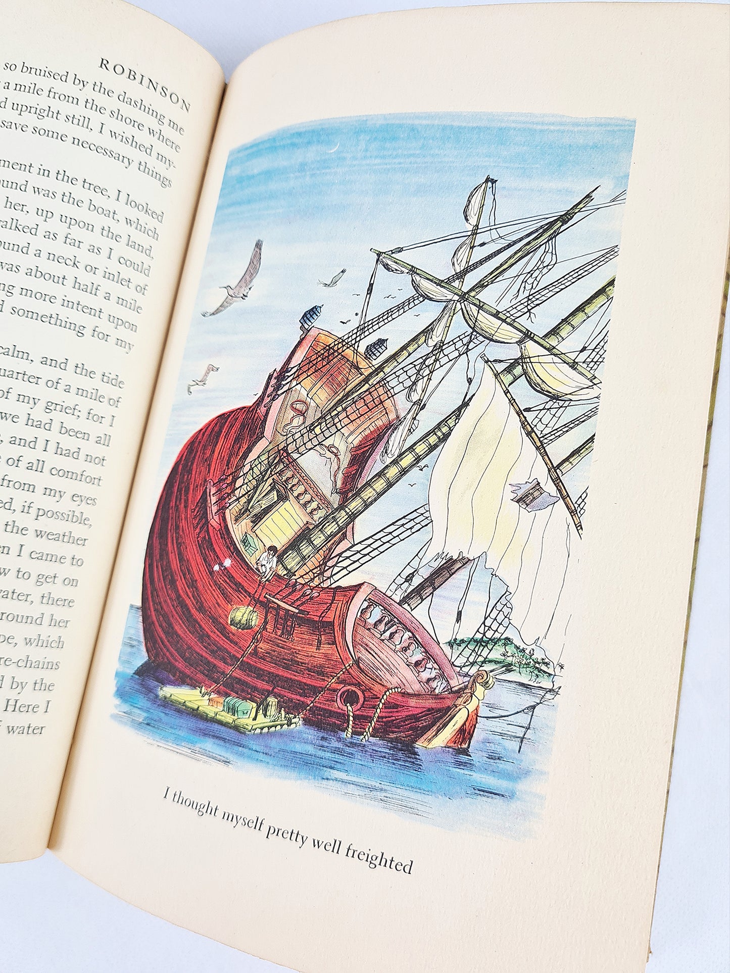 The Life And Adventures Of Robinson Crusoe by Daniel Defoe. Antique childrens book first edition second printing. Rainbow Classics hardcover