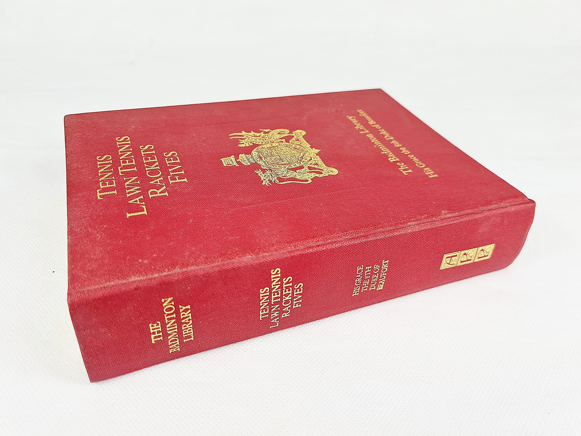 Red vintage hardback book about tennis
